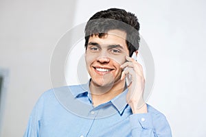 portrait of a man talking on the phone