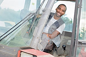 Portrait man in tractor cab