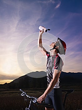 Portrait of man training on mountain bike