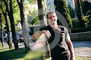 Portrait of Man Training With Slackline In City Park