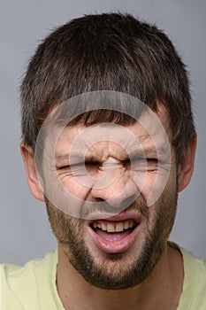 Portrait of a man who smelled, European appearance and close-up