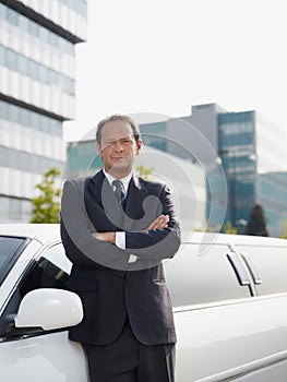 Portrait Of Man Working As Driver In White Limousine