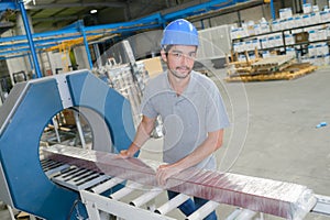 Portrait man working on production line