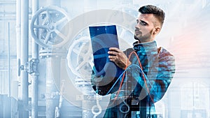 Portrait of manager on factory background