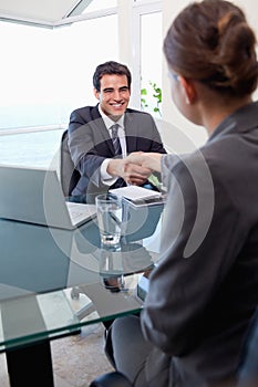 Portrait of a manager interviewing a female applicant