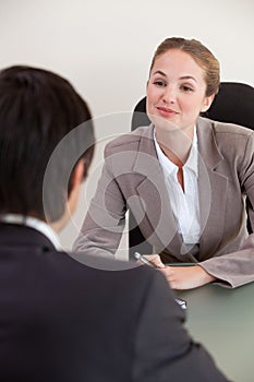 Portrait of a manager interviewing a male applicant