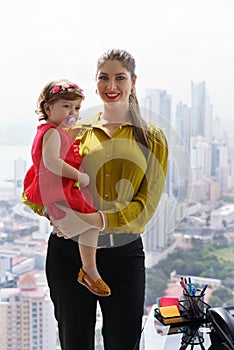 Portrait Manager Mother With Little Daughter In Office