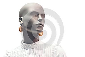 Portrait of mannequin. Woman profile face in store window. Isolated bald dummy