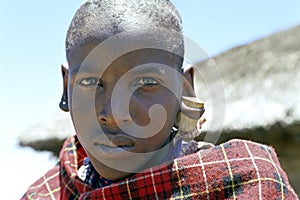 Portrait of Masai Boy with cork in his ear, Kenya