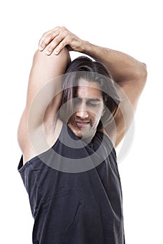 Portrait of masculine guy flexing his muscles
