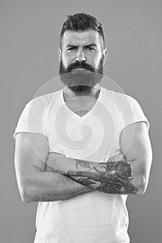 Portrait of masculinity. Bearded man. Hair and beard care. Confident and handsome Brutal man. Mature hipster with beard