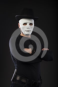 Portrait of Masked Man wearing Bowler Hat