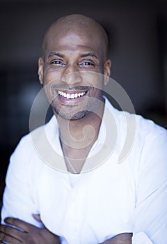 Portrait Of A Mature Black Man Smiling At The Camera.