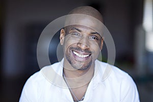 Portrait Of A Mature Black Man Smiling At The Camera.