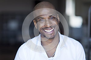 Portrait Of A Mature Black Man Smiling At The Camera.