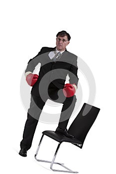 Portrait Of Mature Businessman With Boxing Glove