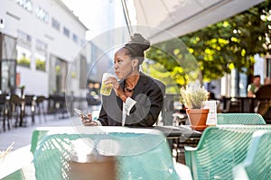 Portrait of a mature businesswoman sitting in an outdoor cafe