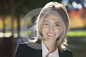 Portrait Of A Mature Businesswoman Smiling At The Camera