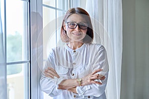 Portrait of a mature confident woman looking into the camera