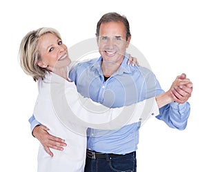 Portrait of mature couple dancing