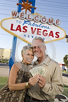 Portrait Of A Mature Couple With Money