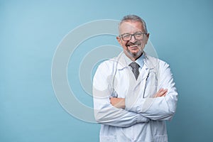 Portrait of a mature doctor standing in a hospital