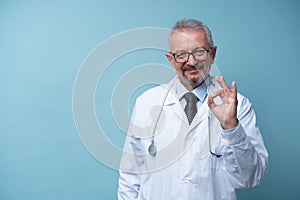 Portrait of a mature doctor standing in a hospital