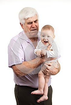 Portrait of a mature grandfather holding grandson
