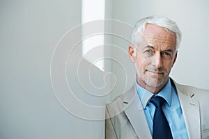 Portrait, mature man and corporate in suit with copy space, confidence and serious look with determination at office