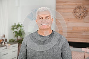 Portrait of mature man laughing