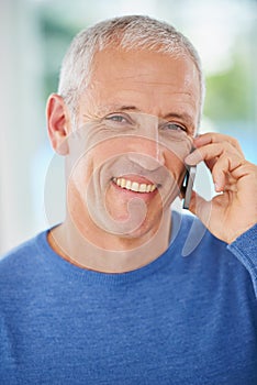 Portrait, mature man and phone call for communication, contact or talking with smile for good news. Closeup, senior male