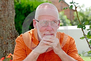 Portrait of a mature man relaxing in the garden