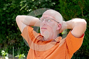 Portrait of a mature man relaxing in the garden