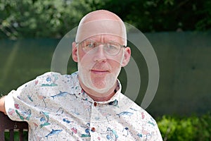 Portrait of a mature man relaxing in the garden