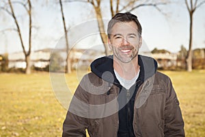 Portrait of A Mature Man Smiling At The Camera