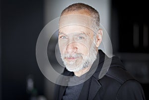 Portrait Of A Mature Man Smiling At The Camera