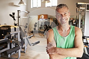 Portrait Of Mature Man Standing In Gym