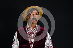 Portrait of mature Ukrainian country-man in traditional clothes