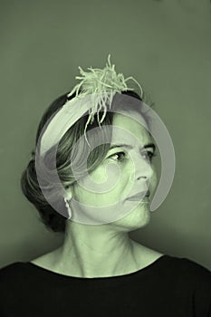 Portrait of mature woman combed and made up style forties