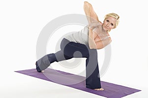 Portrait of mature woman doing yoga