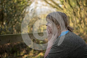 Portrait of mature woman outdoors