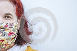 Portrait of mature woman with protective mask