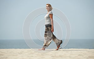 Portrait of a mature woman walking at the beach