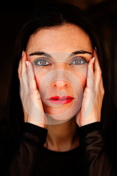 Portrait of a maturity woman with brown eyes photo