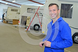 Portrait mechanic in garage motor homes