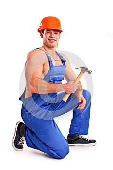 Portrait of mechanic with a hammer