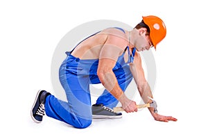 Portrait of mechanic with a hammer