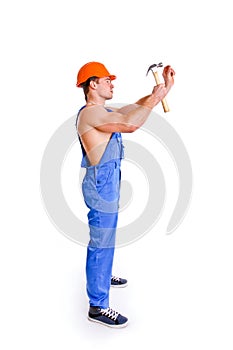 Portrait of mechanic with a hammer
