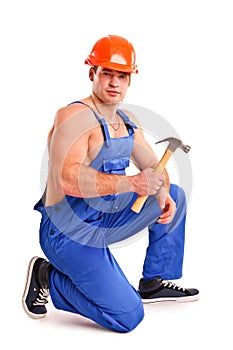 Portrait of mechanic with a hammer