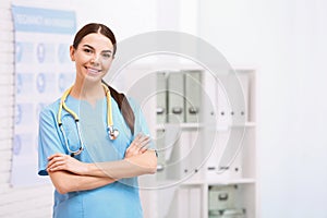 Portrait of medical assistant with stethoscope in hospital.